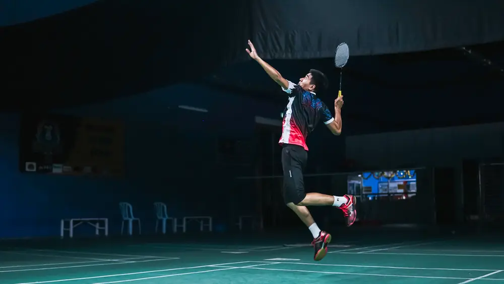 Séance de badminton encadrée dans un club